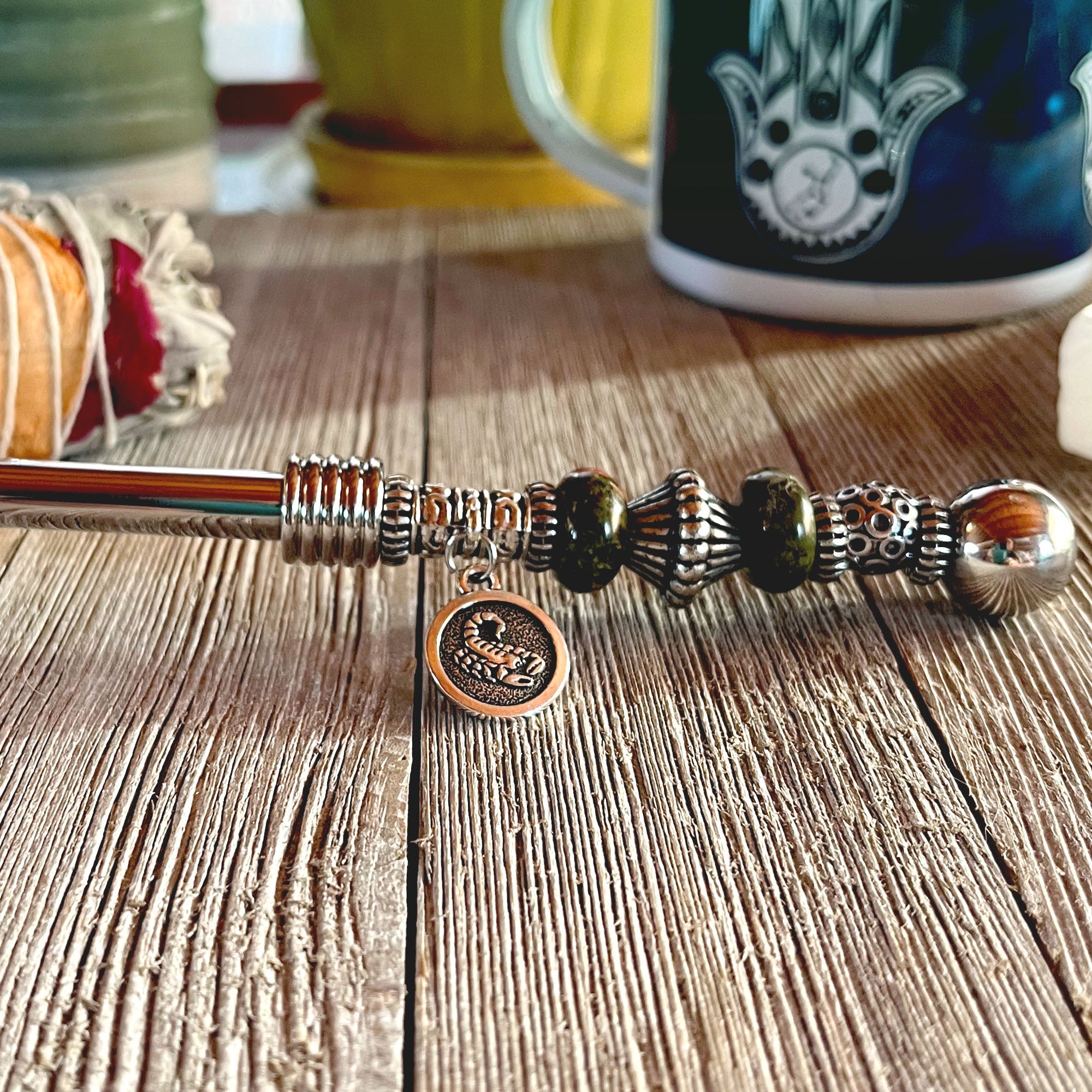 Astro Bowl Spoon by Enlivenadorn, featuring a zodiac charm and focus stone for tea experience.