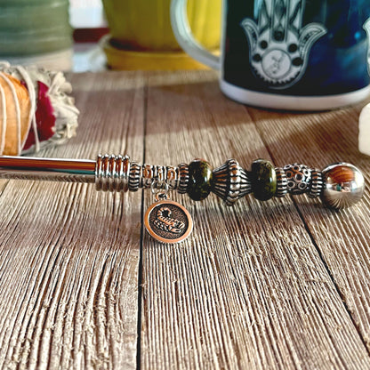 Astro Bowl Spoon by Enlivenadorn, featuring a zodiac charm and focus stone for tea experience.