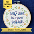 PDF pattern created by Kate, not AI. "self love is never selfish." Quote hand embroidered in color changing thread of pink, lavender, light blue, and royal blue. Surrounding the quote is a floral wreath of yellow and orange daisies. Sewn on white-on-white cotton. Finished wall art is framed in a light wood embroidery hoop.