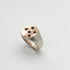 Sterling silver sand blasted ring with rose gold circular signet featuring 5 sapphire stones set in stars, made by hand in mexico, ethical artisan rings in chicago 