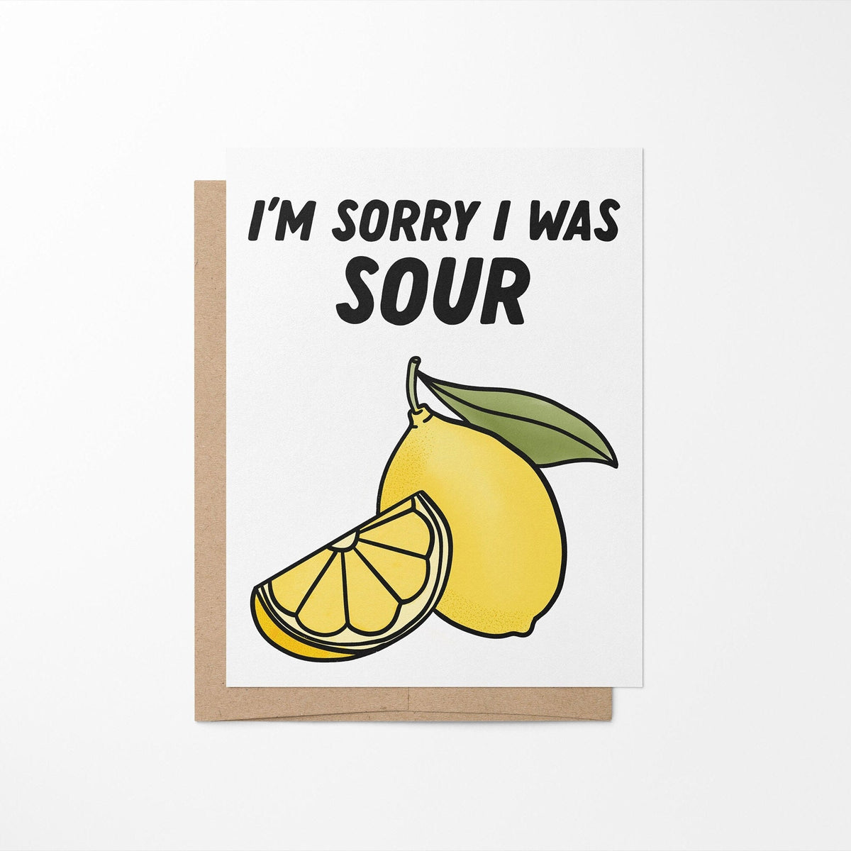 Sorry I was sour apology card detail — lemon illustration and serif lettering close up by indie artist MangoIllustrated
