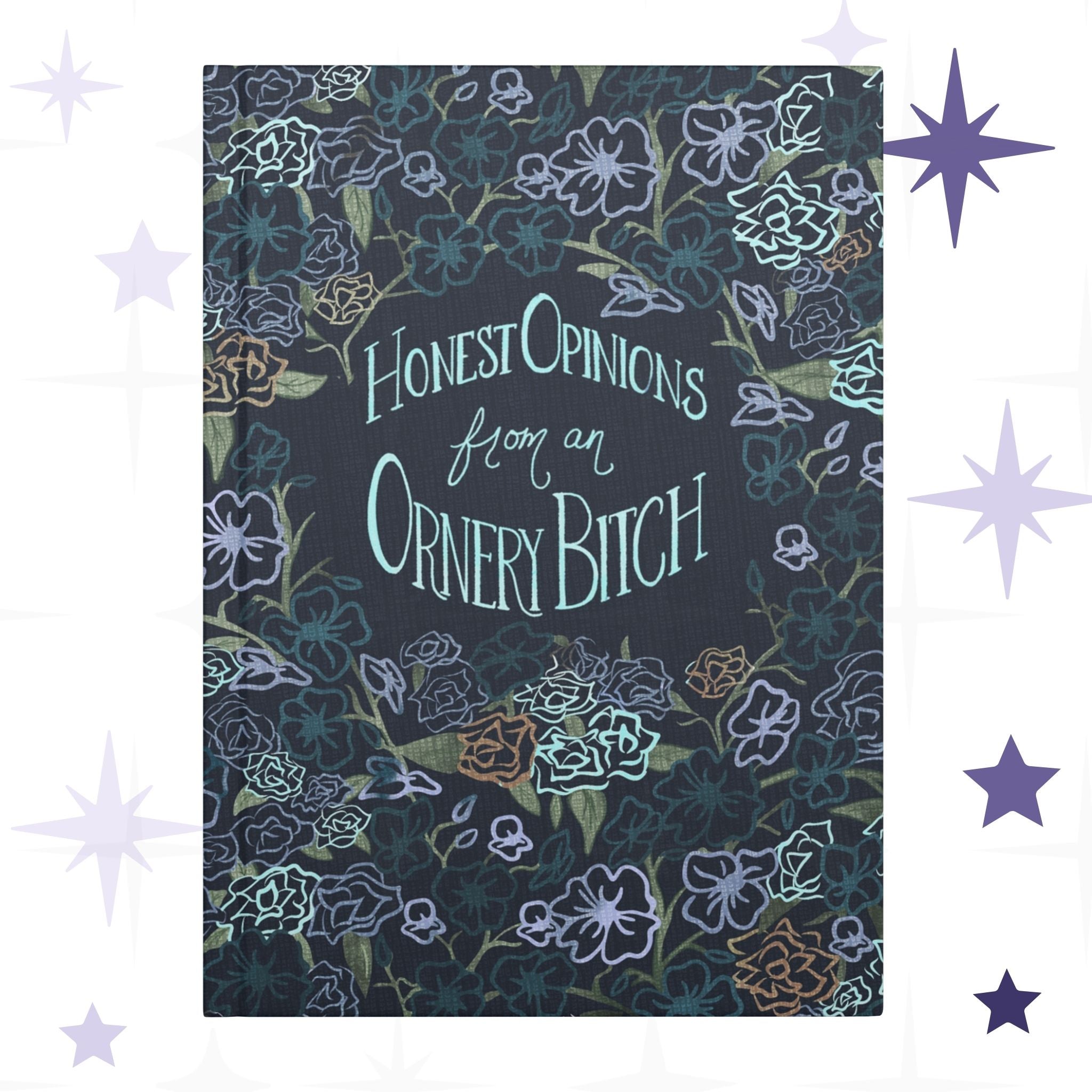 Sweary dark floral hardcover journal with hand-lettered text reading Honest Opinions from an Ornery Bitch surrounded by gothic botanical pattern in lavender teal and copper on navy ground