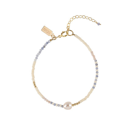 Handmade tanzanite pearl bracelet, ethical artisan gift — Petite Protea Chicago