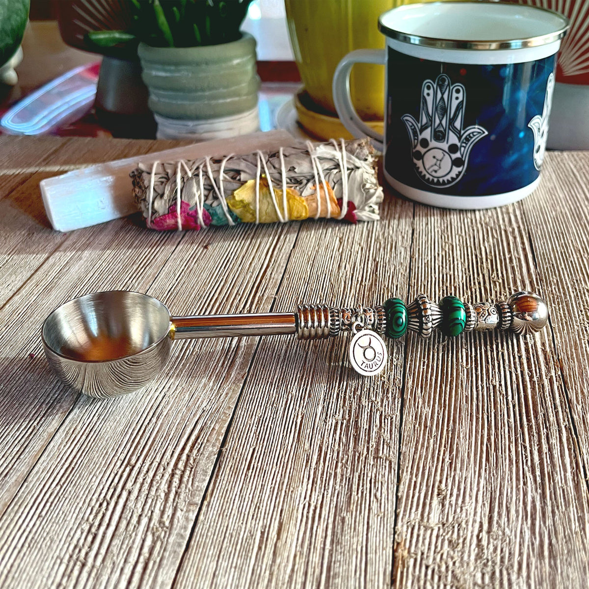 Astro Bowl Spoon with zodiac-themed design and stone handle, ideal for scooping loose teas.