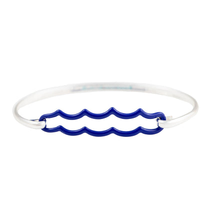 the beach and back best selling wave bangle bracelet now in marine blue double wave motif with silver bangle on white background