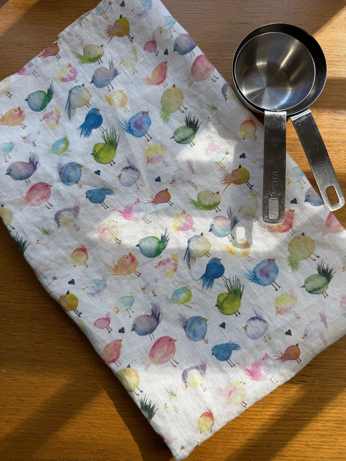 floofy birds linen tea towel