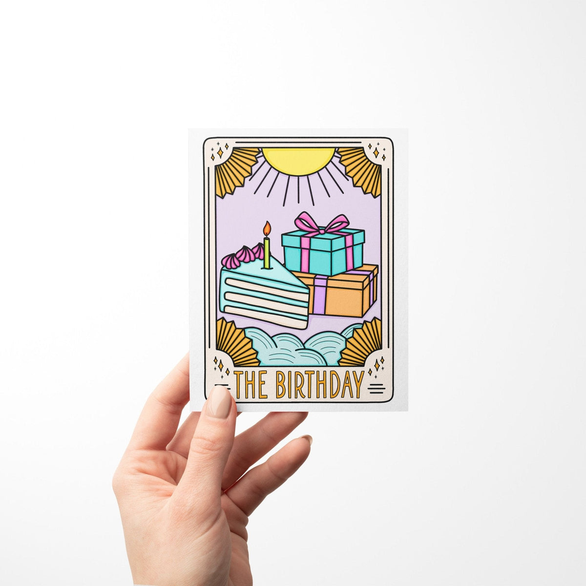 The Birthday Tarot Card Birthday Card detail — close up of the sunburst and layered cake illustration by indie artist MangoIllustrated