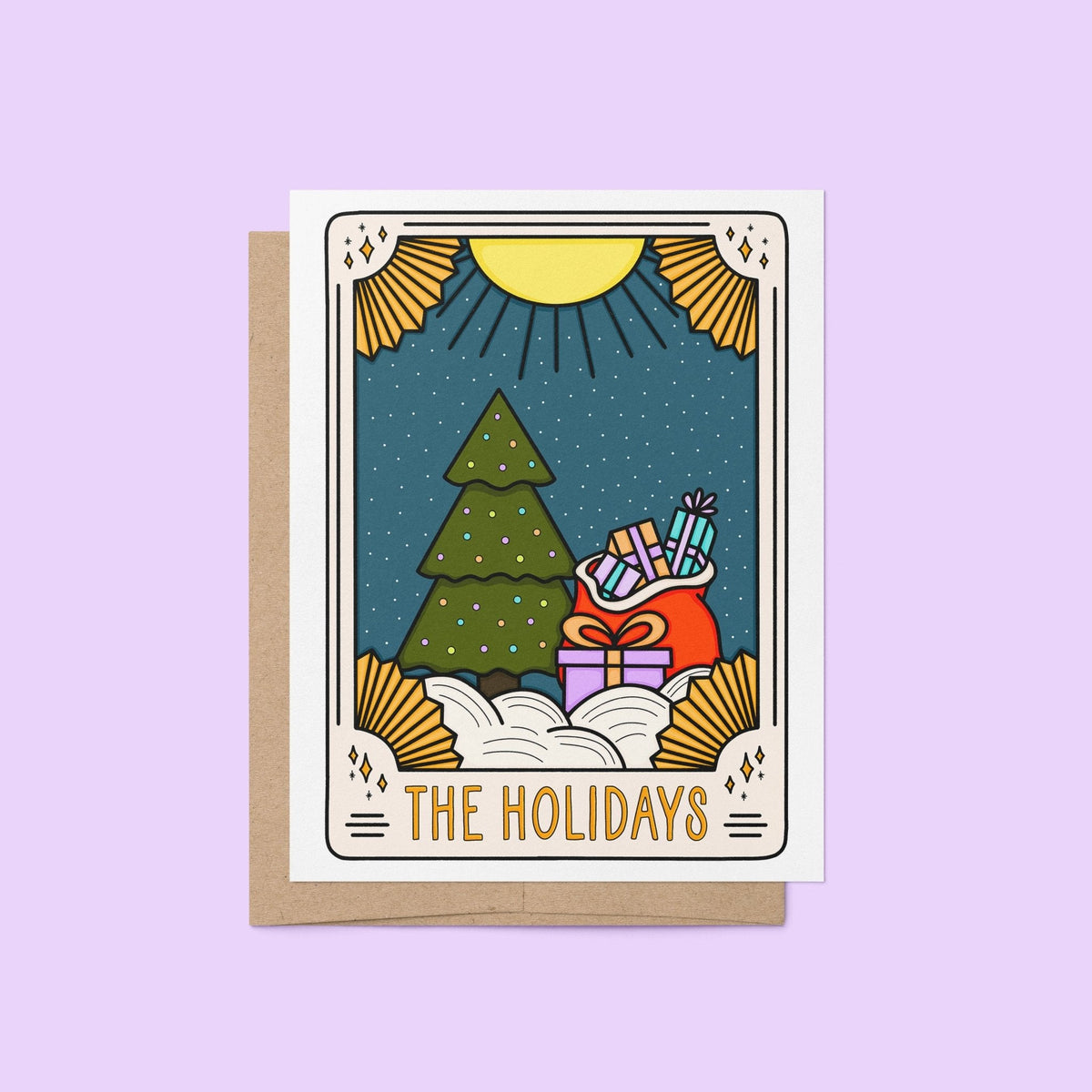 The Holiday Tarot Card Christmas card flat lay — mystical tarot inspired Christmas card on a purple background by indie artist MangoIllustrated