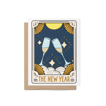 Tarot-inspired New Year greeting card with clinking champagne glasses, starry night background, and art-deco gold detailing. Includes kraft envelope.