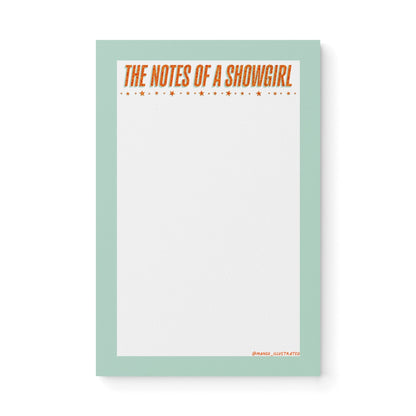 Notepad with mint green border and bold orange text “The Notes of a Showgirl” with star accents – glam stationery pad for lists and journaling.
