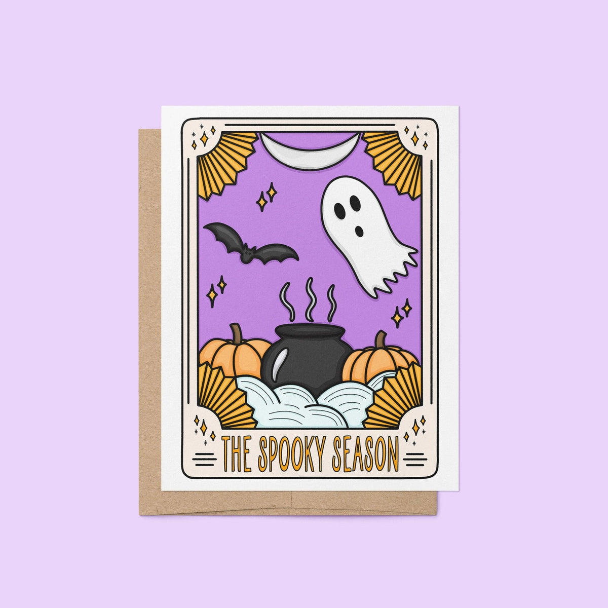 The Spooky Season Tarot Card halloween card flat lay — witchy Halloween card styled on a desk by indie artist MangoIllustrated