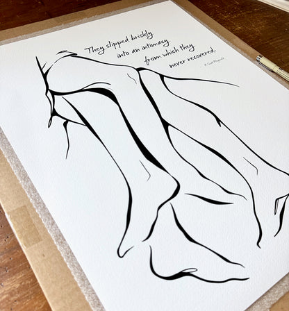 Fine art print of "Together" printed on Aquarelle Rag paper, laying on a wood desk