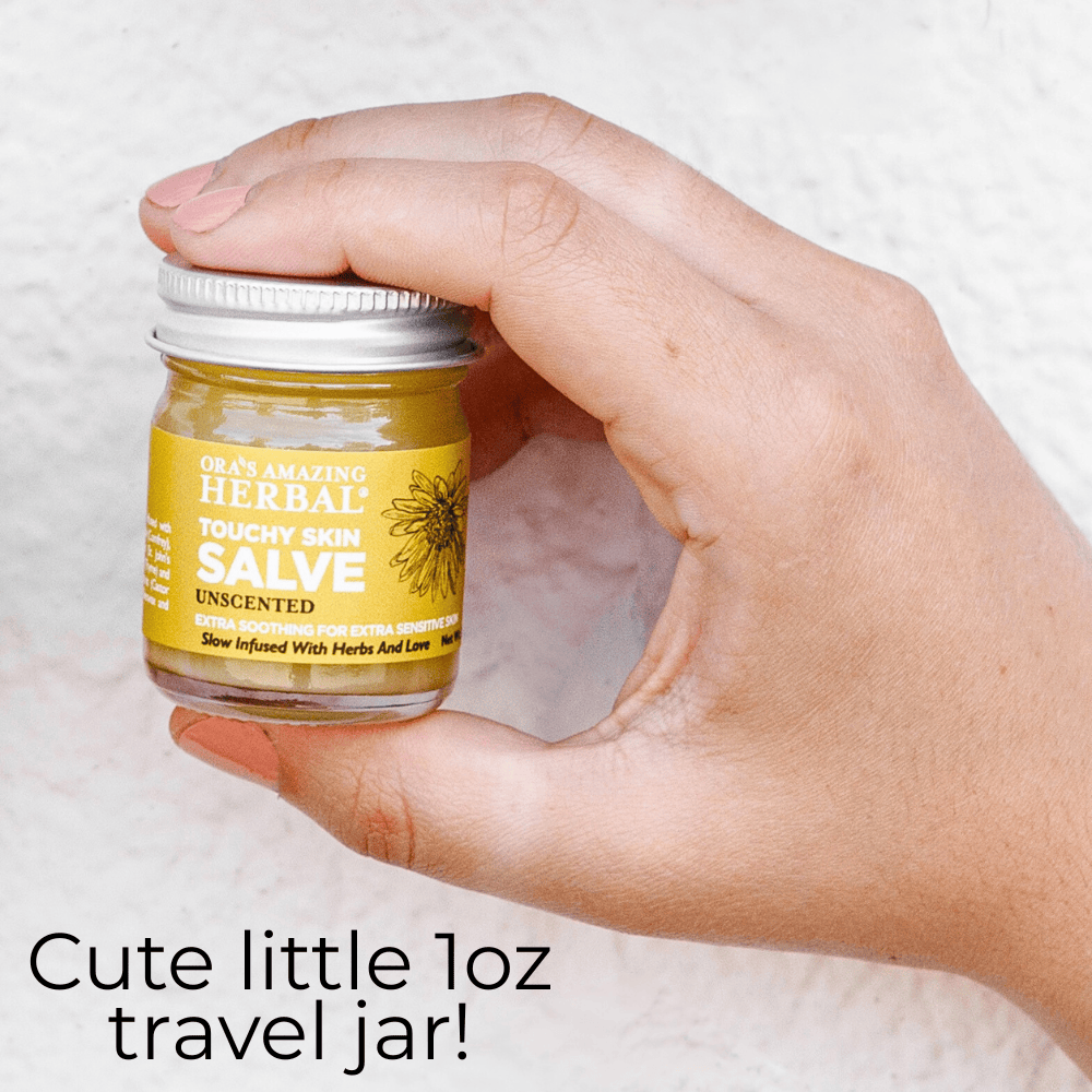 Touchy Skin Salve 1oz Lifestyle Indoor in Human Hand Cute Little Travel Jar