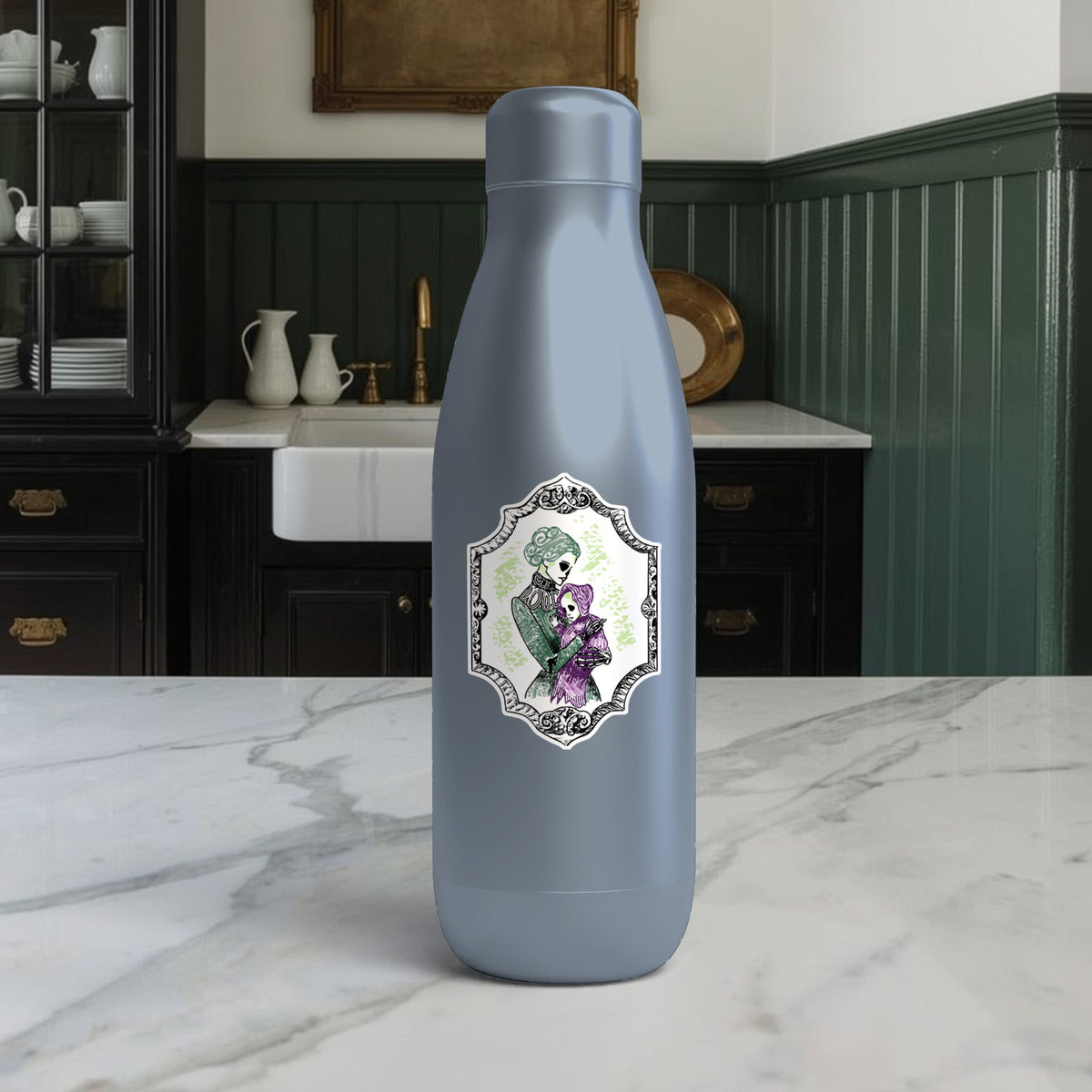 Victorian skeleton mother and baby art on a slate blue insulated water bottle in a dark green kitchen