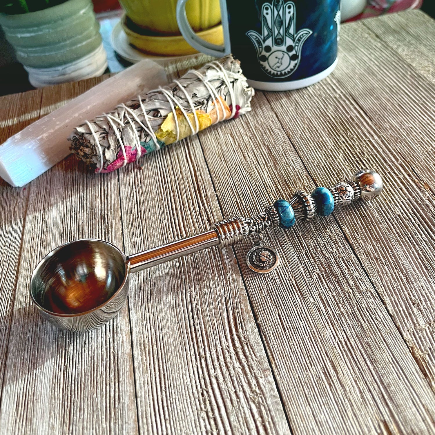 Astro Bowl Spoon featuring enchanting zodiac charm and focus stone handle, perfect for tea lovers.