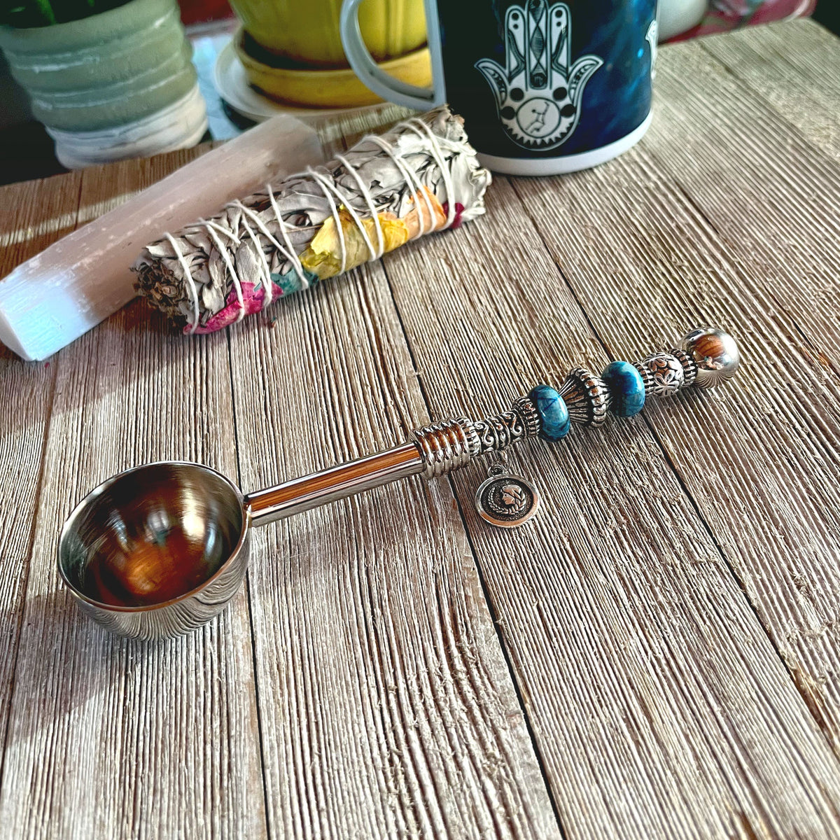 Astro Bowl Spoon featuring enchanting zodiac charm and focus stone handle, perfect for tea lovers.