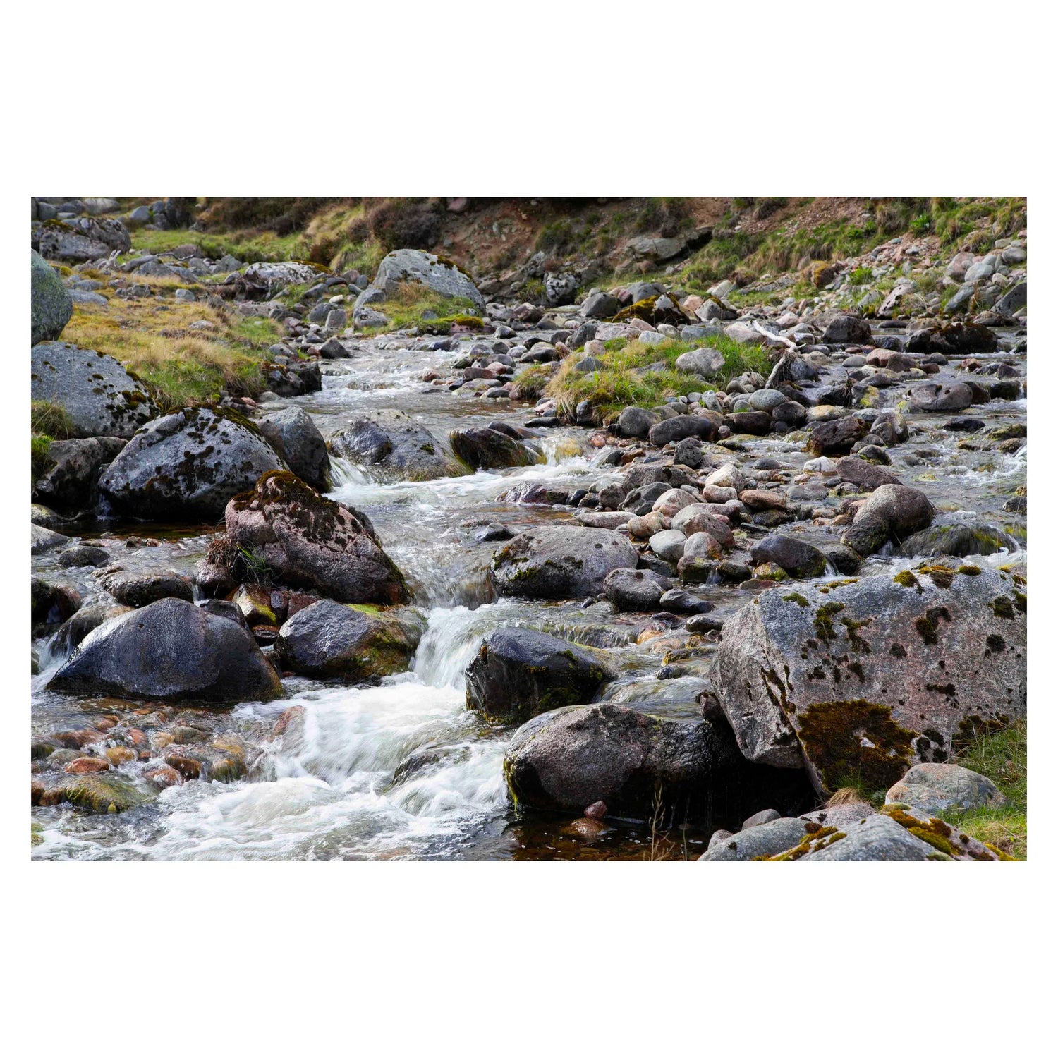 Landscape photograph of a waterfall over the rocks in the River Tilt in Perthshire Scotland. Prints of this image are available for sale and multiple size options.
