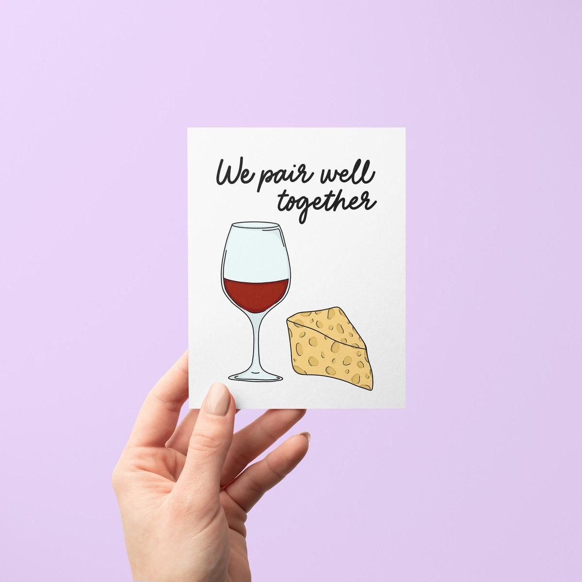 We pair well together card flat lay — illustrated wine and cheese love card for a foodie by indie artist MangoIllustrated