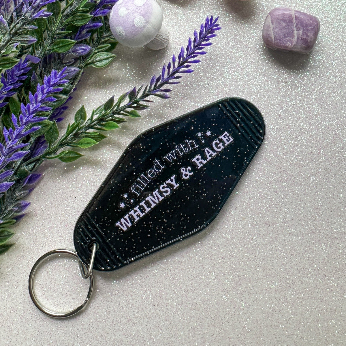 Black keychain with text &