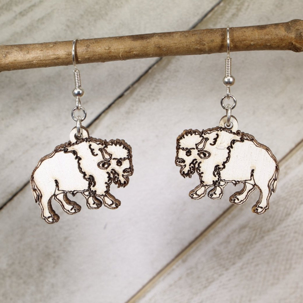 Carry bold western spirit with these White Buffalo Wooden Earrings—hand-painted, lightweight, and perfect for bison lovers, wildlife fans, and rustic, statement-making style.
