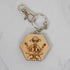 Maple hexagon wood keychain laser-engraved with a retro Area 51 alien design, silver clasp and split ring, handmade in Ohio by PRWMade