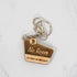 Walnut wood keychain shaped like a trail marker sign, engraved No Room For Hate On This Path with a Bigfoot silhouette, handmade by PRWMade